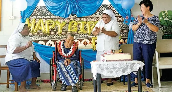 Mary Fong celebrating her 100th Birthday with (from left) Father Law Home Deputy Sister in C harge, Rosa Domowai,  Sister in Charge Aliti Rasiga and president of the Chinese Community, Jenny Seeto on October 4, 2020.  Photo: Kelera Sovasiga