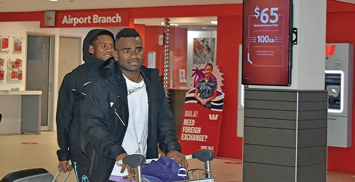 Fiji Airways Fijian sevens utility back Jerry Tuwai (front) with Manueli Maisamoa arriving at the Nadi International airport on January 30, 2023. Photo: Mereleki Nai.