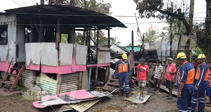 Energy Fiji Limited technician’s check for life wires after a house fire damaged several main line for more than twenty houses at a informal settlement at Caubati in Nasinu on December 1, 2020. Photo: Ronald Kumar.