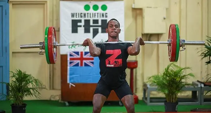 Weightlifter Apakuki Tabuwaiwai makes his lift in the 61 kilogramme category in Suva on May 21, 2022. Photo: Leon Lord