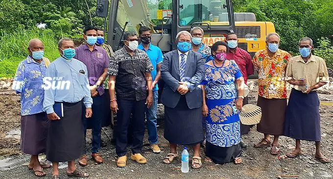 The Minister for Waterways, Environment and Agriculture, Dr Mahendra Reddy (fifth from left), the Permanent Secretary, Joshua Wycliffe (third from left), Member of Parliament, Jese Saukuru (sixth from right) with the Vitogo Villagers after the commissioning of the de-silting works project in Lautoka on February 3, 2022. Photo: Nicolette Chambers 