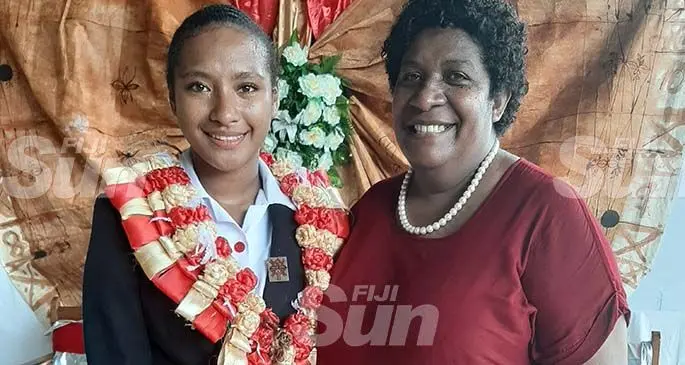 Adi Cakobau School head girl Beverly Vai with guardian, Ana Soqeta, after the prefects induction at the school in Sawani on February 2, 2020 . Photo: Shreeya Verma