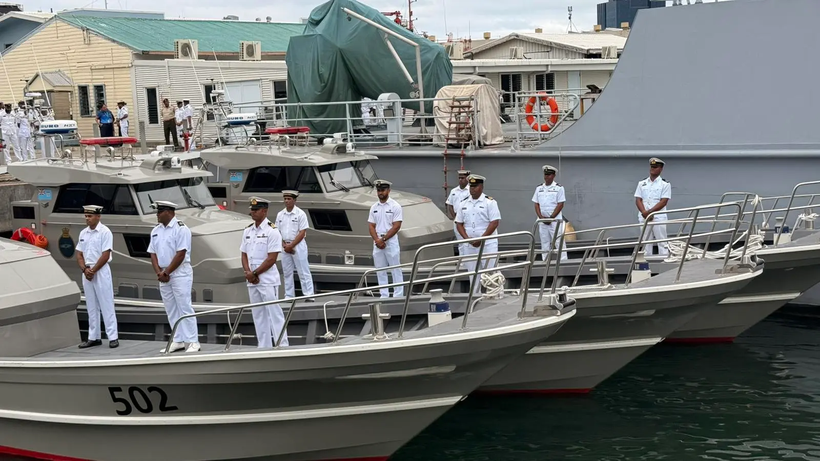 Members of the Fiji Navy on board the three patrol boats during the official handover.