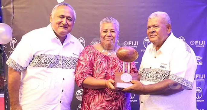 From left: Fiji Rugby Union chairman Francis Kean, Emelini Racika with husband and Fiji Rugby Union Hall of Fame recipient Atonio Racika during the FRU awards at Suva’s Grand Pacific Hotel last night. More on award >P32. Photo: Kelera Sovasiga