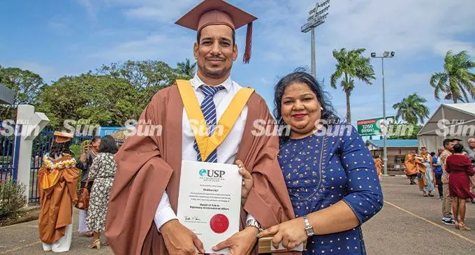 Graduate Shabhan Hassan with his wife Shahana Ali after the University of the South Pacific graduation at the FMF Gymnasium, Laucala Bay, Suva on May 13, 2022. Photo: Leon Lord