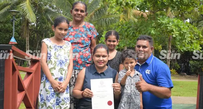 Sheleen Chand with her husband Kamal Narayan, children Krishal, Ankita and Krishvi Narayan and Mother-in-low Jag Rani following her Fiji National Univerity Bachelor of Education graduation. Photo: Ronald Kumar
