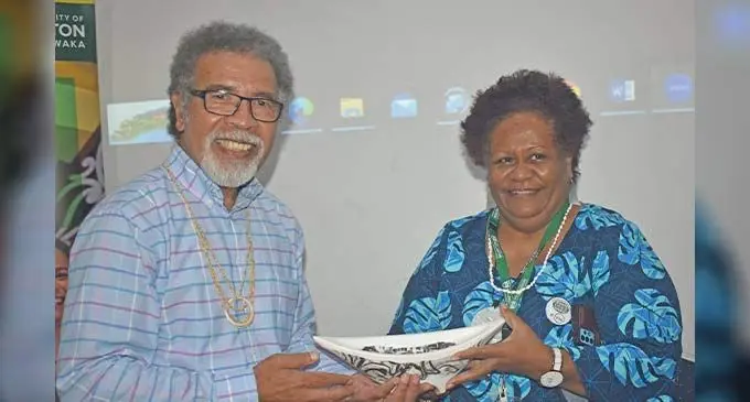 Oceania Comparative and International Education Society (OCIES) President and Victoria University of Wellington School of Education Associate Professor Doctor Kabini Sanga (left) hands over the waka to Fiji National University Dean of the College of Humanities and Education Professor Unaisi Nabobo Baba during the OCIES 50th annual conference at the FNU campus in Natabua,Lautoka on November 21, 2022. Photo: Salote Qalubau