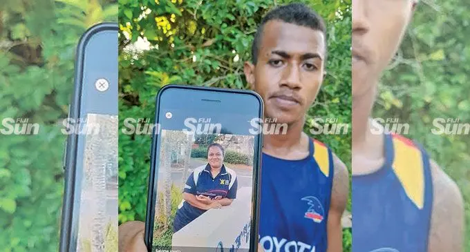 David Iosefo holds a photo of his late sister, Salome Iosefo, at Qina Settlement, Nawaka on June 6, 2022. Photo: Waisea Nasokia