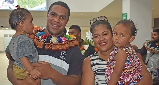 Fiji Airways Flying Fijians rep Johnny Dyer with wife Maraia and children Dexter and Jane at the Nadi International Airport on November 19, 2019. Photo:  Waisea Nasokia