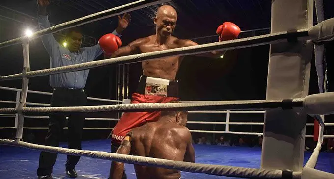 Abhay Chand celebrate after knocking Nereo Cakautini on the canvas at Prince Charles Park in Nadi on Saturday night. Photo: WAISEA NASOKIA