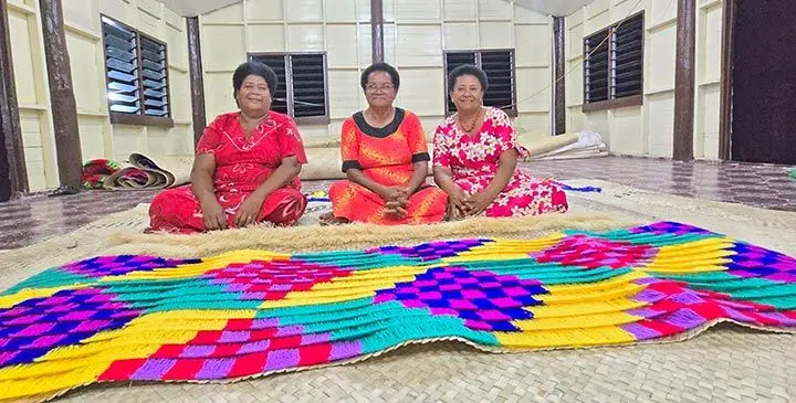 Women of Nayau prepare fine mats at Narocivo Village, Nayau as anticipation builds ahead of the installation of the Tui Nayau Ratu Tevita Mara tomorrow. Pictured (from left), Kasalaini Rasoqosoqo, Amelia Railala and Mere Cagi on July 5, 2025. Photo: Sosiveta Korobiau
