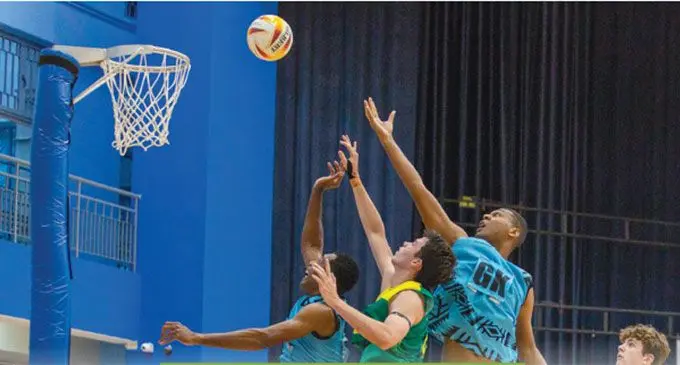 Crest Fiji men’s goalkeeper (GK) Nacanieli Goneyali and goal defense Atonio Bakaniceva (left) defend against Australia Under-20 goal shooter during the Men’s Nation Series final in Singapore on December 8, 2024.  Photo: Fiona Chong
