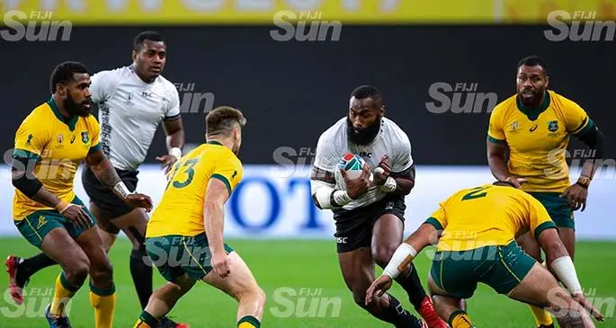 Fiji Airways Flying Fijians winger Semi Radradra (with ball) attempts to break through Australia’s defence line during their Rugby World Cup Pool D match opener in the Sapporo Dome, Japan, on September 21, 2019. Fiji lost 21-39. Photo: Bruce Southwick/ZoomFiji