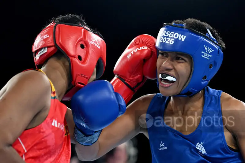 Jasmine Daunakamakama of Fiji (blue) against Keshaini Hanisika of Sri Lanka (red) during the Women’s 57kg Boxing quarter final of the Glasgow 2026 Commonwealth Games at SEC Centre Hall 5 in Glasgow, Scotland, Wednesday, July 29, 2026. 