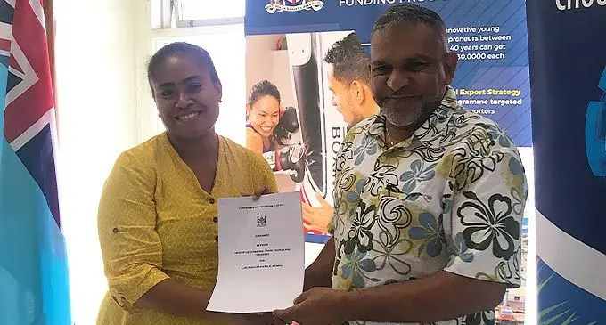 Luse Raovana (left), with the Minister for Commerce, Trade and Tourism, Faiyaz Koya, in Labasa on June 30, 2022. Photo: Shratika Naidu