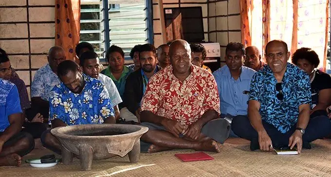 Nakoro villager, Jovili Lewamosa (middle) during discussions with the Minister for Agriculture Mahendra Reddy. Photo: Nicolette Chambers