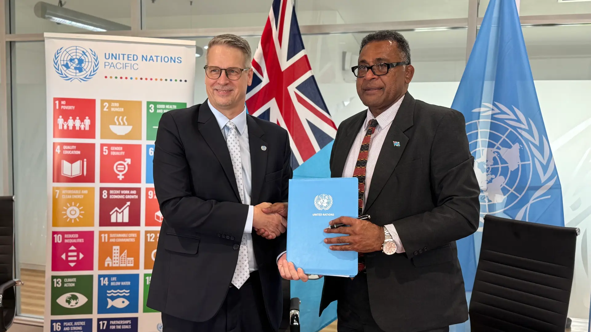 Front row, from left: Dirk Wagner (UN coordinator to Fiji) and Esrom Immanuel (Minister For Finance Strategic, Planning, National Development and Statistics) with Stakeholders at Ro Lalabalavu House on May 14, 2026. 