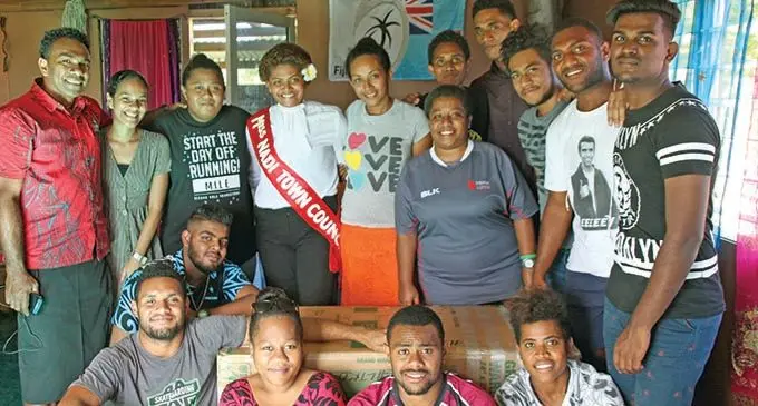 University of the South Pacific students while visiting Atelaite Koto’s family in Togomasi, Nadi, earlier this week. 