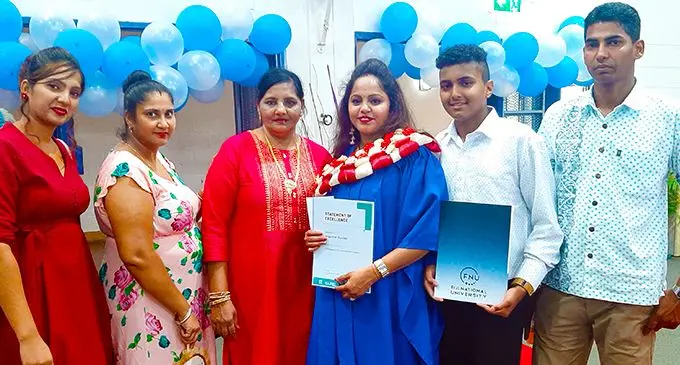 From left: Gyatri Naicker, Kamini Naicker (cousins), Sarawati Naicker (mother), Angeline Naicker, Kartik Naicker (son), Avinash Naickar (brother) after the FNU College of Agriculture, Fisheries and Forestry graduation ceremony at the FMF Gymnasium on March 11, 2020.  Photo: Shreeya Verma