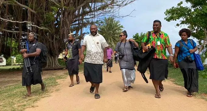 Minister for Health and Medical Services Dr Ifereimi Waqainabete (third from left) in Moala, Lau, on November 4, 2020, followed by media personnel. Photo: Fiji NDMO