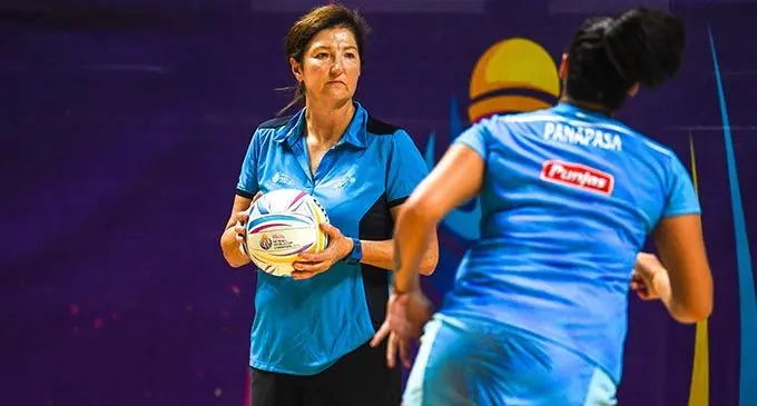Fijian Pearls head coach Vicki Wilson monitors Lydia Panapasa during their warm-up session in Liverpool, England. Photo: Ian Muir