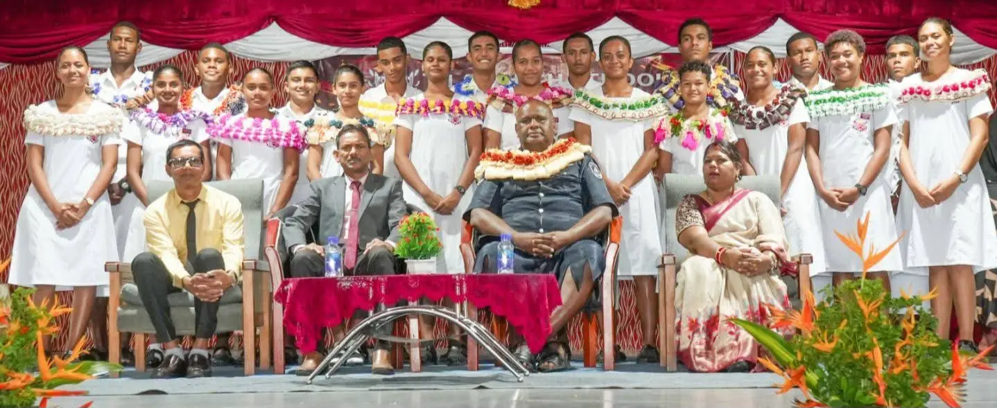 (Sitting third from left) Divisional Police Commander Western, Senior Superintendent of Police (SSP) Iakobo Vaisewa, with the Tilak High School teachers and members of the student council body. 