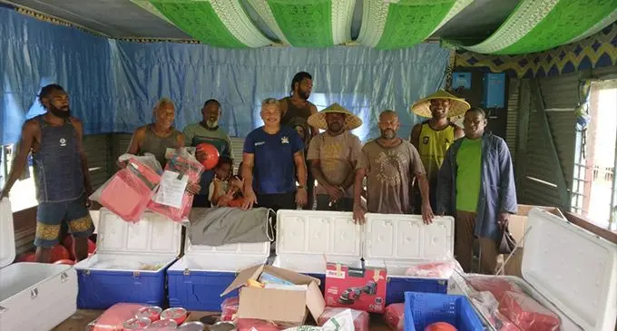 Food and Agriculture Organisation of the United Nations consultant and Captain Ned Hill (middle) handed over assistance to three cooperatives in Bua on January 26, 2023. Photo: Ministry of Fisheries