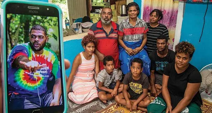 Family members of the deceased Lemeki Duidomo (insert right), from left: Jasiliva Rokobote (sister), Sailasa Rasala (father), Teresia Ema (mother), Meresiana Naioba (sister), Viliame Ucuna (brother), Sulueti Tolevu (sister-in law) and nephews Vilimone Lacanivalu 8 and Mataisi Bulivou 10 at their home in Lami  Village on April 3rd 2022.  Photo: Leon Lord