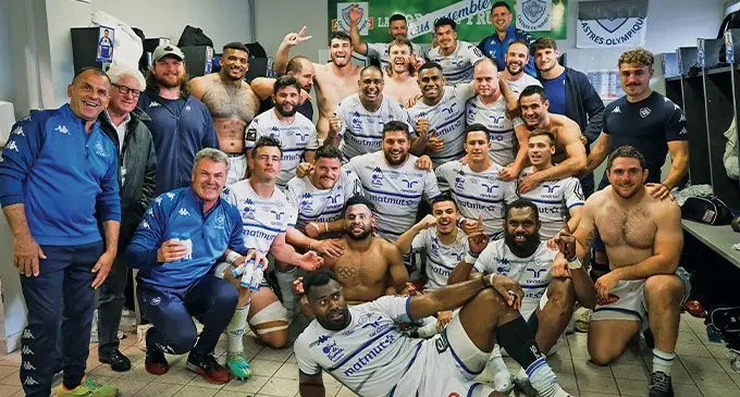 French Top 14 Castres Olympique with Fijian players Josua Raisuqe (front), Vilimoni Botitu (sitting, left), Leone Nakarawa (sitting, third from left) and Adrea Cocagi (fourth row, third from left) after their 16-13 win over Brive on May 13, 2023. Flying Fijians assistant coach Seremaia Bai played 93 matches for Castres. Photo: Castres Rugby 