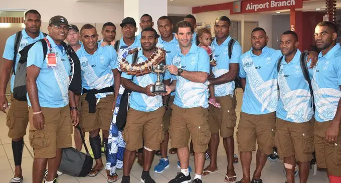 Fiji Airways Fijian 7’s team with the Hamilton 7s Cup at the Nadi International Airport on February 6, 2018. Photo: Waisea Nasokia