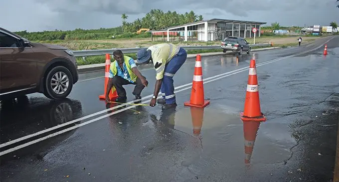 Water Authority of Fiji workers attending to the sewer spill along the Denarau Bridge in Nadi on March 5, 2019. Photo: Nicolette Chambers