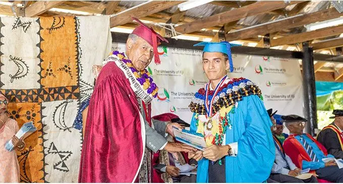 Alexander Wise (right) during his graduation ceremony. He graduated from the Bachelors of Medical Health Science Programme from the University of Fiji. 