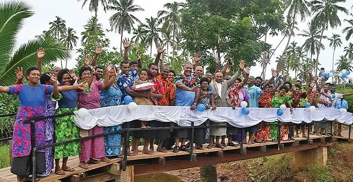 Minister of Rural, Maritime Development and Disaster Management Sakiasi Ditoka (with garland) with the villagers during the opening of the newly constructed foot crossing in Cakaudrove on March 24, 2023.