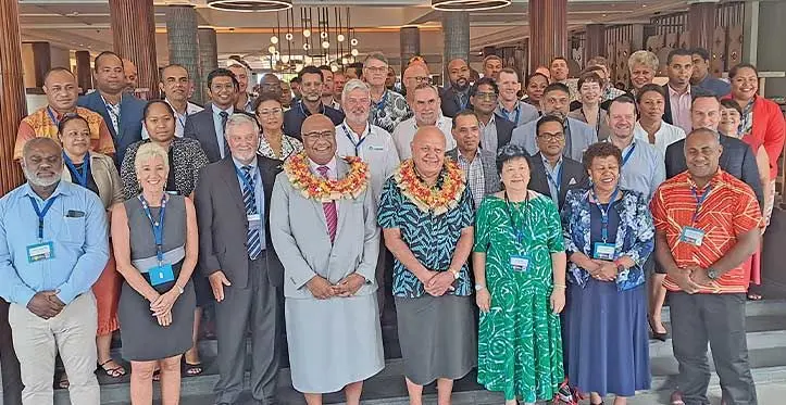 Deputy Prime Minister and Minister for Trade, Co-operatives, Small and Medium Enterprises and Communications Manoa Kamikamica (wearing garland left) with Deputy Prime Minister and Minister for Tourism and Civil Aviation Viliame Gavoka (wearing garland right) with participants of the inaugural Fiji Tourism Investment Summit at the Sheraton Fiji Golf and Beach Resort, on Denarau. Photo: Waisea Nasokia