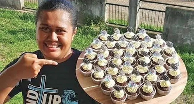 Pastor Maca Tabuya with her cupcakes.