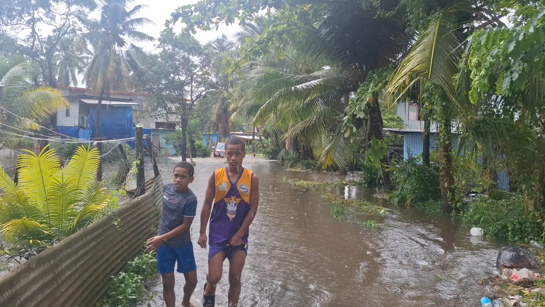 Children of Nawajikuma settlement in Nadi caught up in the flood.
