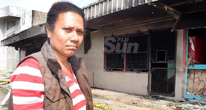 Raijeli Vasau 41, outside the restaurant she was working before it was destroyed in fire on December 20, 2019. Photo: Ronald Kumar