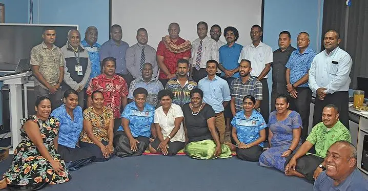 Minister of Infrastructure and Meteorological Services Ro Filipe Tuisawau (with garland) with staff at the Fiji Meteorological office in Nadi. Photo: Waisea Nasokia