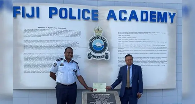 Fiji Police Force director operations SSP Kasiano Vusonilawe and Fiji  Higher Education Commission director Dr Rohit Kishore at the Fiji Police Academy.
