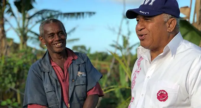 Prime Minister Voreqe Bainimarama with award-winning farmer, Konalevulevu Tobesoisoi, in Tailevu on July 8, 2019. Photo: Prime Minister Frank Bainimarama