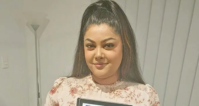 Ektaa Bali showing her book, The Unicorn Princess, at her home in Brisbane, Australia on October 23, 2020.