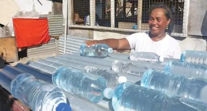 Kiribati is promoting a new solar water disinfection method involving heating plastic water bottles on corrugated iron. Photo: RNZ Pacific/European Commission