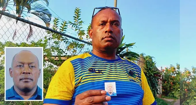 Ropate Ralogilala holds up a picture of his late brother Rupeni Talakuli at Waiyavi,  Lautoka on August 8, 2022. Photo: Salote Qalubau
