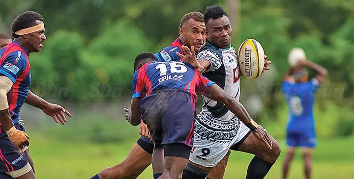Jerry Tuwai plays for Barbarians Brothers as he fends off a tackle during the Fiji Bitter Marist Sevens tournament at the HFC Bank Stadium in Suva on March 21, 2025. Photo: Leon Lord