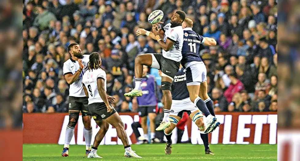 FIJI Water Flying Fijians winger Vuate Karawalevu fails to catch the ball against Scotland’s wing Duhan van der Merwe during their Autumn Nations Series International rugby union Test at Murrayfield Stadium in Edinburgh on November 2, 2024. Photo: AFP 