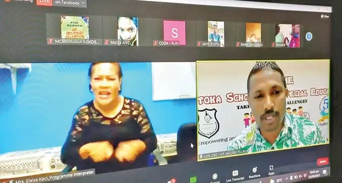 Lautoka School for Special Education Head Teacher, Kailash Pillay with an interpreter of the school, Elaisa Kaci and other participants during the International Day of Sign Language virtual celebration on September 23, 2021.