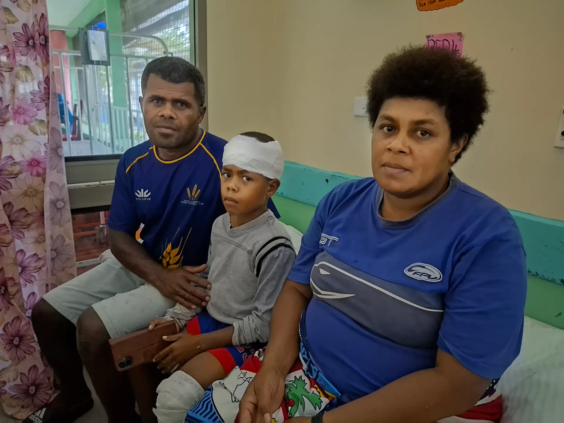sulueti vicokai (mother), mitieli vaidua (father) and son Peni Nasova at the Nadi Hospital.