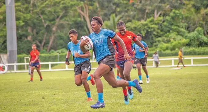 Mt Masada player Adi Vani Buleki runs away from Seahawlks defence during the Fiji Rugby Union Super Sevens Series 2021 at Sigatoka’s Lawaqa Park on the January 22, 2021. She is a squad member in both Fijiana 7s and 15s. Photo: Leon Lord