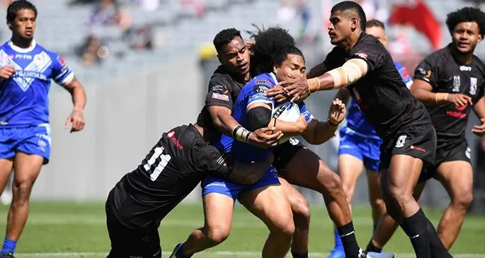 Vodafone Fijian Bati forward Viliame Kikau (11) and Tui Kamikamica make their tackle count against Toa Samoa during the Oceania Cup Test at Eden Park, in Auckland, New Zealand on November 2, 2019.