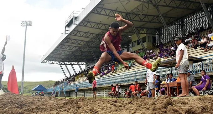 Kavekini Baselawa of Red House wins gold with a leap of 6 meters during the Senior Boys long jump at the Lawaqa Park in Sigatoka yesterday. Photo: WAISEA NASOKIA